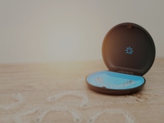 An open, round invisalign case representing a Diamond Invisalign Provider.