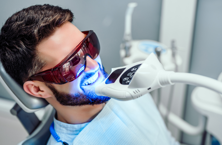 Man undergoing teeth whitening treatment